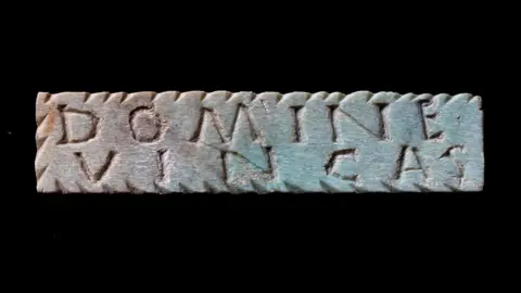 Tony Jolliffe BBC Bone inscribed tag fragment, broken/cut neatly at one end, thought to be associated with Roman gladiators